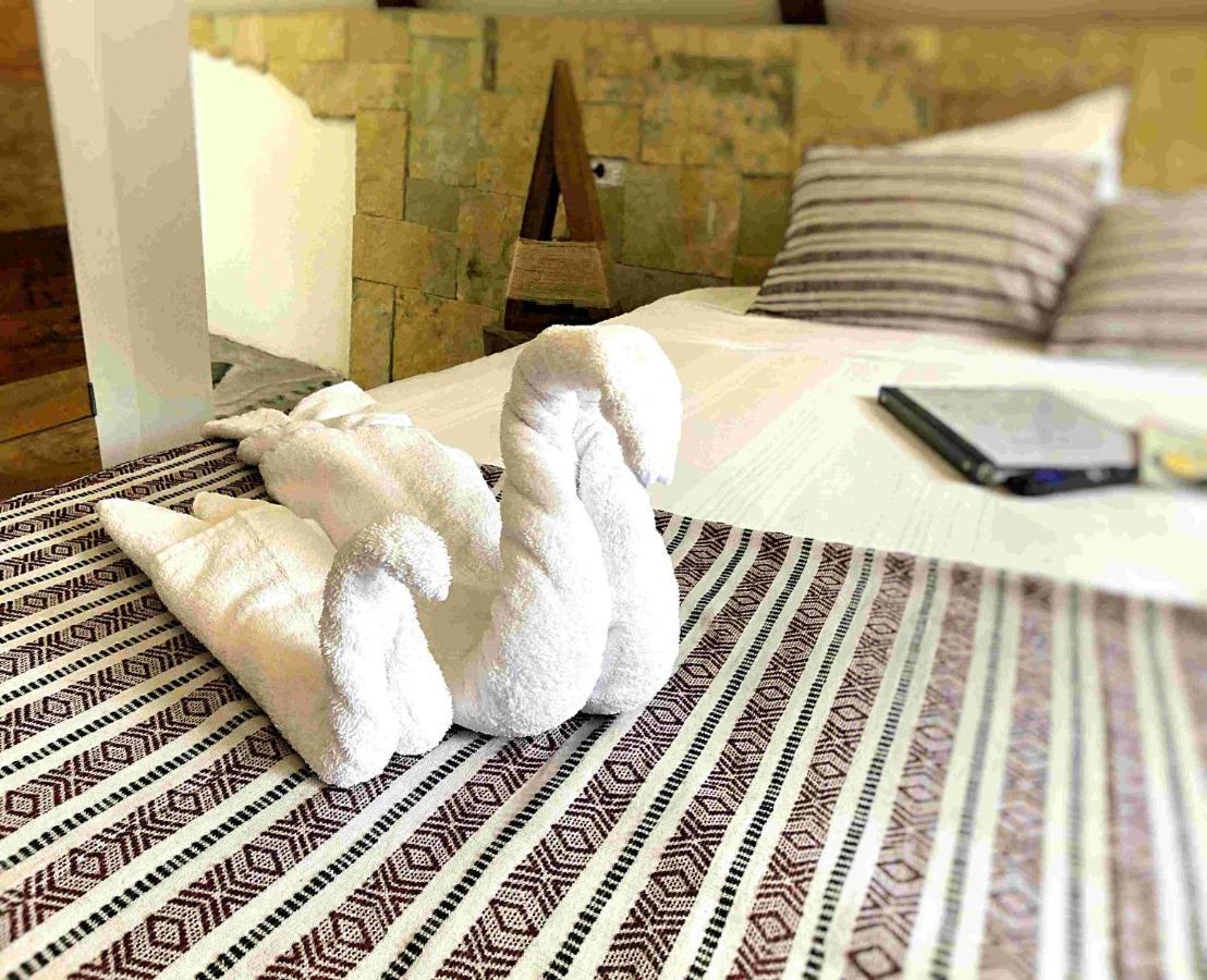 Kin Resort Lodge Maya Beach Extérieur photo